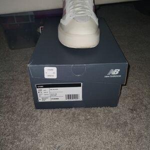 New Balance White and Pink Sneakers